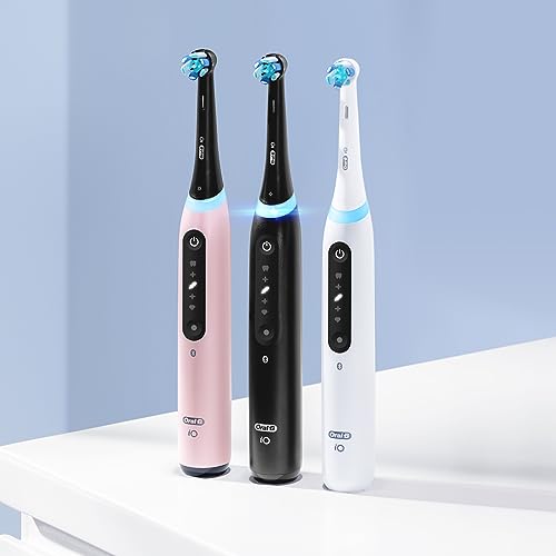 Oral-B iO Series 5 Rechargeable Electric Toothbrush with Visible Pressure Sensor to Protect Gums, 2 Minute Timer, 5 Cleaning Settings, 1 Replacement Toothbrush Heads, and Travel Case, White
